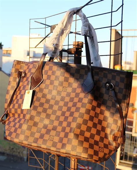 louis vuitton neverfull mm damier ebene fake|louis vuitton damier ebene geronimos.